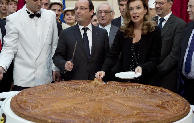 François Hollande et Valérie Trierweiler le 10 janvier 2014 à l'Elysée lors de la galette des rois [Alain Jocard / AFP/Archives]