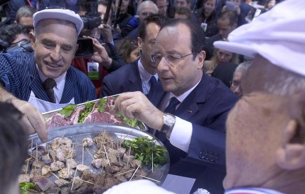 Le président François Hollande au Salon de l'agriculture, le 22 février 2014 Porte de Versailles, à Paris [Alain Jocard / Pool/AFP]