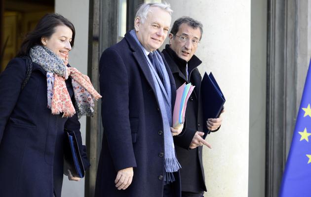 Cécile Duflot, Jean-Marc Ayrault et Francois Lamy à la sortie du Conseil des ministres le 5 mars 2014 à l'Elysée à Paris [Alain Jocard / AFP/Archives]