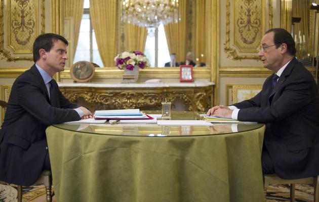 Manuel Valls reçu par Francois Hollande avant le premier Conseil des ministres le 4 avril 2014 à l'Elysée à Paris [Fred Dufour / Pool/AFP]