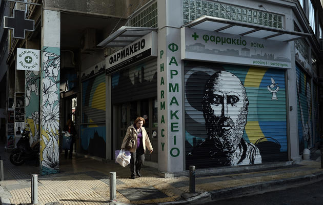 Une pharmacie restée close dans le centre d'Athènes, le 9 avril 2014 jour de grève générale [Louisa Gouliamaki / AFP]