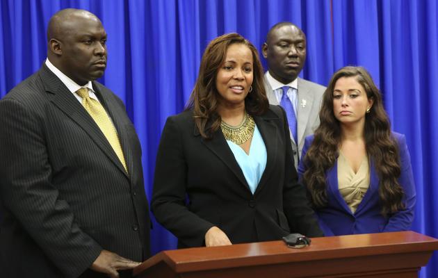 Les avocats de la famille de Trayon Martin s'adressent à la presse, le 13 juillet 2013, après que George Zimmerman a été acquitté du meurtre du jeune Noir [POOL / Getty Images/AFP]