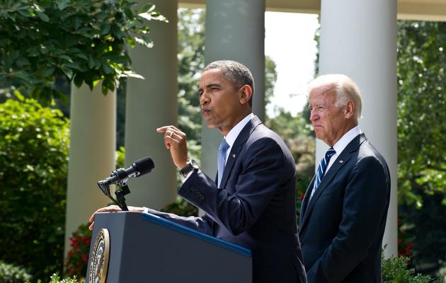 Barack Obama et Joe Biden dans la Roseraie de la Maison Blanche lors d'une conférence de presse sur la Syrie le 31 août 2013 [Nicholas Kamm / AFP]