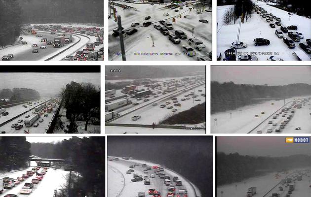 Montage de vidéos du Département des transports de Caroline du Nord montrant les difficultés sur les routes provoquées par la neige, le 12 février 2014 [ / Département des Transports de Caroline du Nord/AFP]