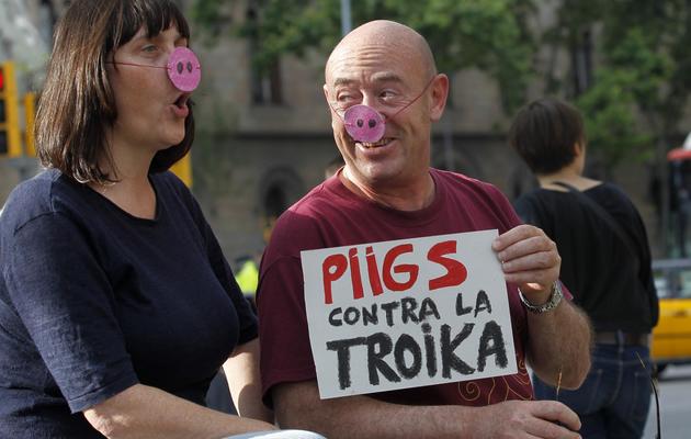 Des Espagnols manifestent contre la Troïka et l'austérité, à Madrid le 1er juin 2013 [Quique Garcia / AFP]
