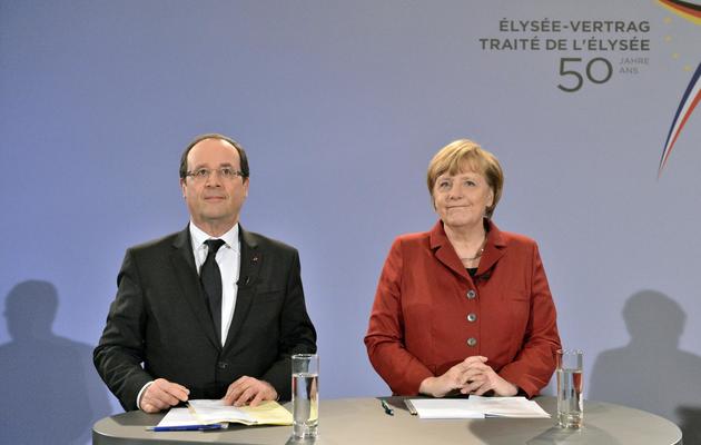 François Hollande et Angela Merkel à Berlin, le 21 janvier 2013 [Bertrand Langlois / AFP]