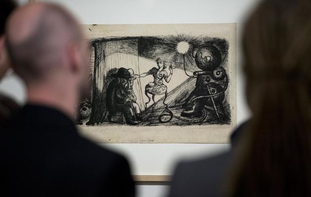 Le dessin "Film and Reality" (1944) du Tchèque Bedrich Fritta, exposé au Musée juif de Berlin, le 15 mai 2013 [John Macdougall / AFP]
