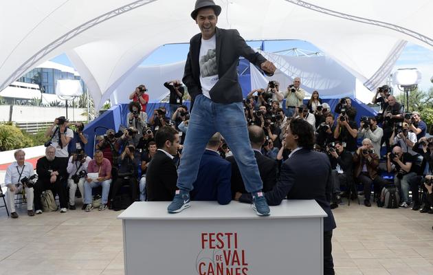 Jamel Debbouze pose pour la sortie du film "Né quelque part", le 21 mai 2013 à Cannes [Anne-Christine Poujoulat / AFP]