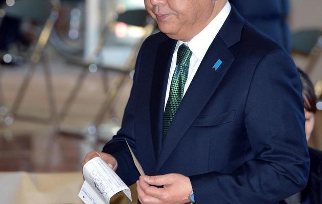 Le Premier ministre Yoshihiko Noda dans un bureau de vote de Funabashi, près de Tokyo, lors des législatives japonaises, le 16 décembre 2012 [Tadayuki Yoshikawa / AFP]