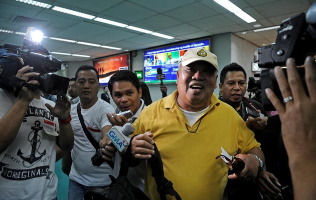 Alex Aguja, l'un des ex-otages philippins, à son retour le 20 janvier 2013 à Manille [Noel Celis / AFP]