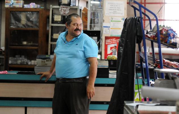 Le commerçant Federico Aguiar dans son magasin à Tegucigalpa le 31 mai 2013 [Orlando Sierra / AFP]