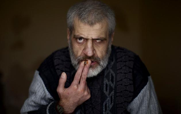 Un patient de l'hôpital psychiatrique Dar Al-Ajaza, à Alep le 18 décembre 2012 [ / AFP]