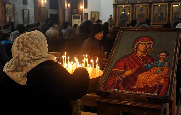 Célébration de la messe de Noël dans une église orthodoxe de Damas, le 24 décembre 2012 [ / AFP]