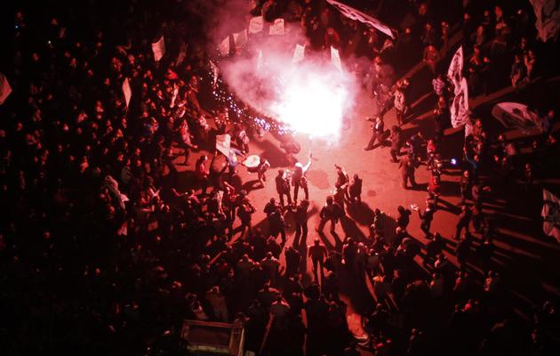 Des manifestants le 24 janvier 2013 place Tahrir au Caire [Mohammed Abed / AFP]