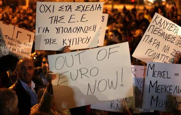 Manifestation devant le Parlement chypriote contre le plan d'aide européen, le 21 mars 2013 à Nicosie [Patrick Baz / AFP]
