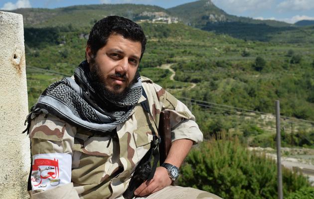 Le chef de la brigade Ezz Abdal-Salam, Jamil Lala, le 23 avril 2013 dans la province de Lattaquié, en Syrie [Miguel Medina / AFP]