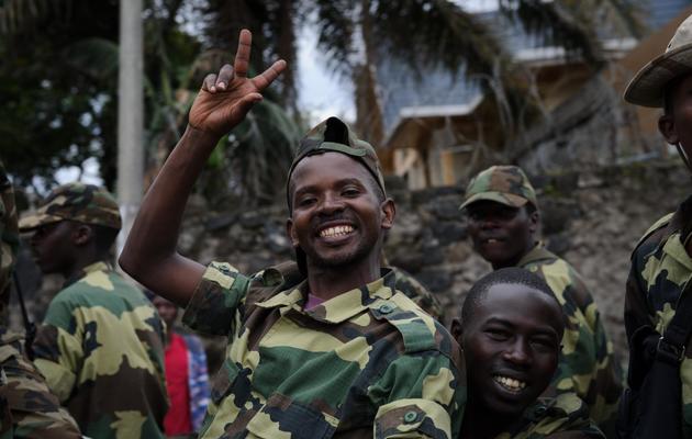 Des rebelles du M23 fêtent la prise de Goma, le 20 novembre 2012 en RDC [Phil Moore / AFP]