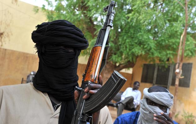 Des combattants islamistes le 12 juillet 2012 à Gao, dans le nord-est du Mali [Issouf Sanogo / AFP/Archives]