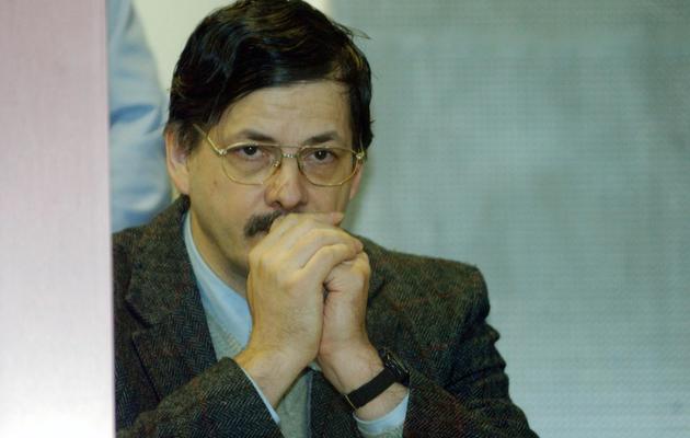 Le meurtrier pédophile Marc Dutroux lors de son procès à Arlon, en Belgique, le 22 avril 2004 [ / Pool/AFP/Archives]