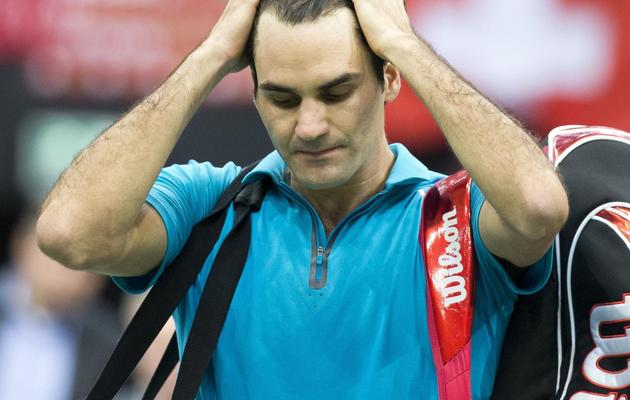 Le Suisse Roger Federer après sa défaite face au Français Julien Benneteau, le 15 février 2013 à Rotterdam. [Koen Suyk / ANP/AFP]