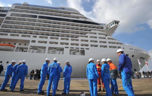 Des employés du navire MSC Preziosa, le 14 mars 2013 à Saint-Nazaire [Frank Perry / AFP]