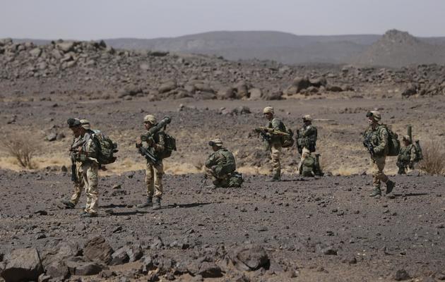 Des soldats français patrouillent dans l'Adrar des Ifoghas, le 16 mars 2013 [Kenzo Tribouillard / AFP]