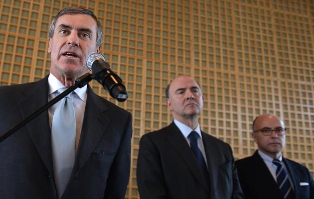 Jérôme Cahuzac (g) s'exprime lors de la passation de pouvoirs au ministère des Finances à Paris, le 20 mars 2013 [Miguel Medina / AFP]