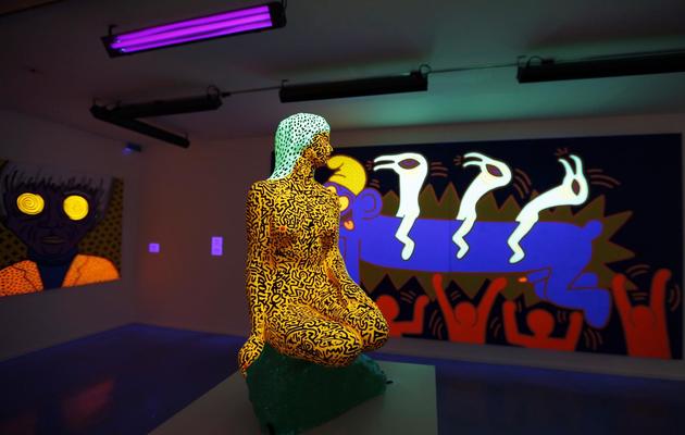 Plusieurs oeuvres de l'artiste américain Keith Haring exposées à partir du 19 avril 2013 au Musée d'art moderne à Paris [Francois Guillot / AFP]