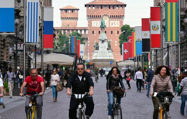 Des cyclistes dans le centre de Milan, le 22 mai 2013 [Giuseppe Cacace / AFP]