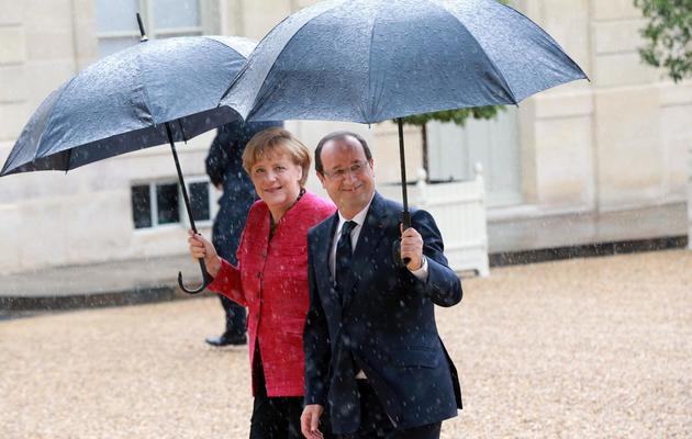 Le président français François Hollande et la chancellière allemande Angela Merkel à l'Elysée, le 30 mai 2013 [Pierre Verdy / AFP]