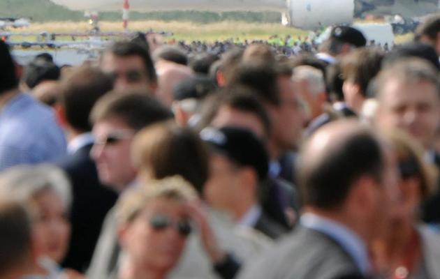 La foule se presse pour assister au premier vol de l'Airbus A350, le dernier né de l'avionneur européen, le 14 juin 2013 à Toulouse [Eric Cabanis / AFP]