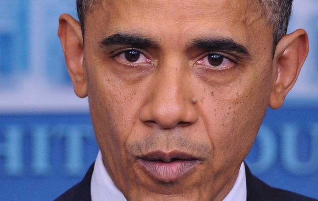 Le président Barack Obama, très ému, le 14 décembre 2012 à Washington après la fusillade dans une école du Connecticut [Mandel Ngan / AFP]