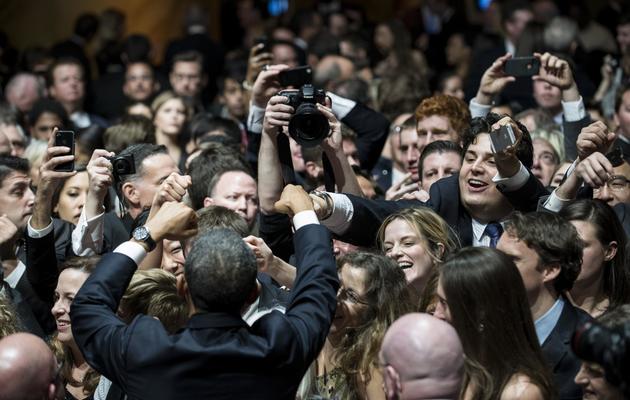 Barak Obama acclamé le 20 janvier 2013 à la Maison Blanche à Washington [Brendan Smialowski / AFP]