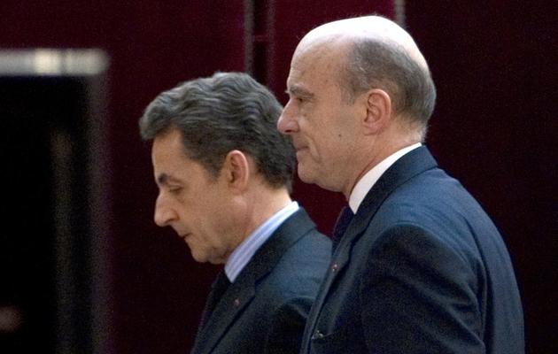 Nicolas Sarkozy et Alain Juppé à Paris, le 20 janvier 2012 [Charles Platiau / Pool/AFP/Archives]