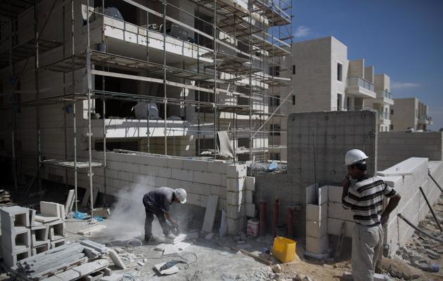 Un chantier de construction dans une colonie juive près de Jérusalem-Est, en août 2013 [Menahem Kahana / AFP/Archives]