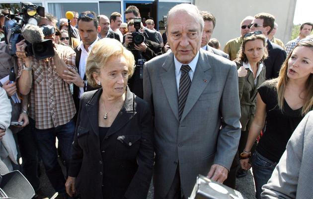 Jacques Chirac, alors président de la République, et sa femme Bernardette, le 22 avril 2007 à Sarran [Patrick Kovarik / AFP/Archives]